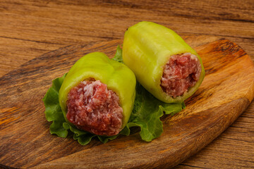 Raw stuffed pepper for cooking