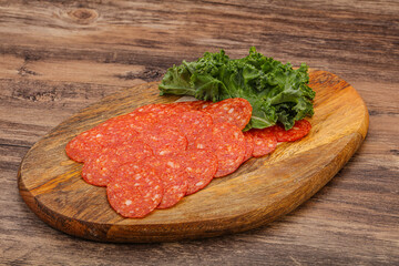 Italian spycy pepperoni sausage slices