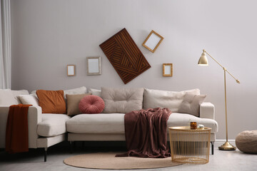 Modern living room interior with comfortable sofa