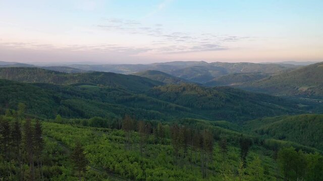 Scenery of the Silesian Beskids from Rownica peak at sunrise. Poland