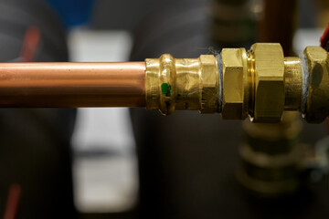 Copper piping and joint in detail.