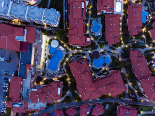 Aerial evening photography, drone view. Panoramic view of the hotels and pools of Sveti Vlas in Bulgaria. Summer holiday in Europe.