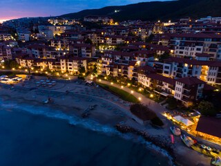 View from above of the hotels in night Sveti Vlas in Bulgaria. Summer holiday in Europe. Aerial photography, drone view.