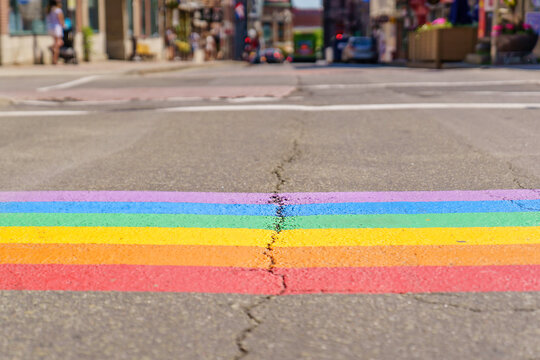 Gay Pride Flag Crosswalk On The Road Of A City