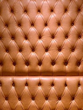 A detail of a leather luxury sofa