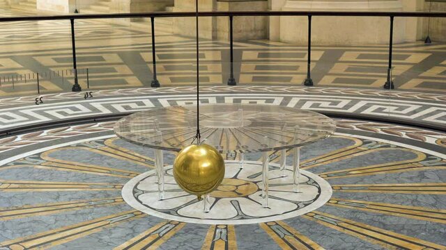 Foucault pendulum moving in the Pantheon de Paris. It was conceived by Leon Foucault in 1851 as an experiment to demonstrate the Earth's rotation.