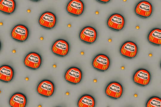 pattern of Red Japanese Daruma on grey background