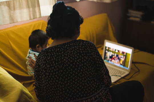 Mother and child looking at computer