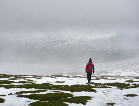 Walking In Heavy Snow On Wild Boar Fell, Cumbria, UK.