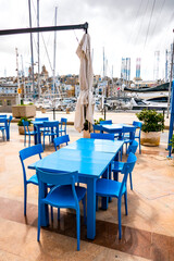 tables and blue chairs