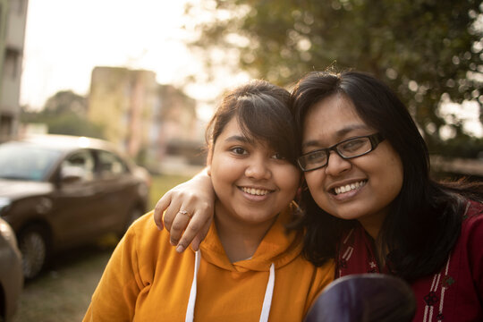 Sisters of a family interacting and making fun together