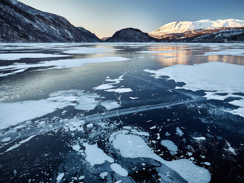 Greenhouse gases bubble up to freezing icy surface of Arctic water causing climate change
