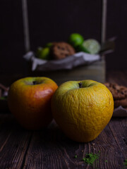 Dried yellow apples on a dark background