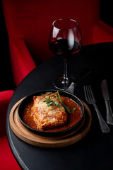 Beef lasagna and red wine, yammy elegant photo