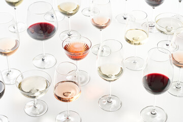 Assorted wine in shiny glasses on table