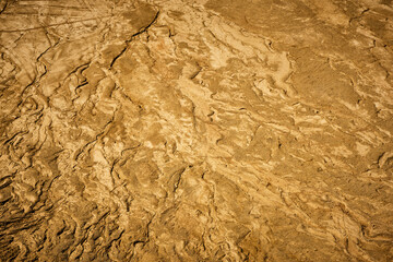texture of a raised sand pit in the afternoon