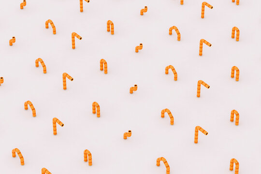 pattern of Orange pipe tubes on white background
