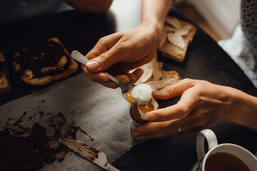 Woman having egg for breakfast