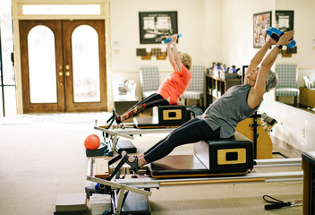 Couple of Senior women in Pilates Class
