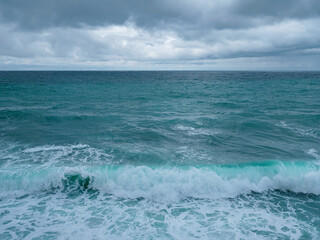 view of ocean waves and a fantastic rocky shore