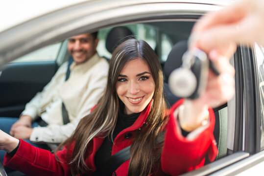 Young woman taking her car keys