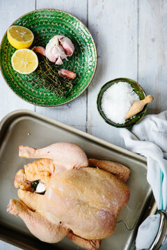 A chicken ready for roasting.
