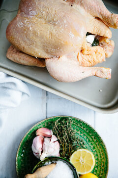 A chicken ready for roasting.