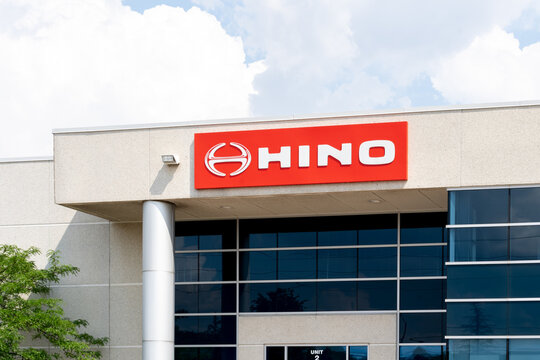 Mississauga, On, Canada - June 13, 2021: Close-up Of Hino Sign On The Building.  Hino Motors Ltd Is A Japanese Manufacturer Of Commercial Vehicles And Diesel Engines. 