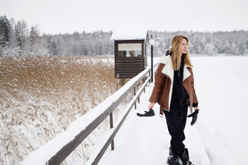 Woman walking outdoors on a winter day