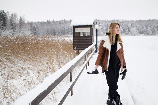 Woman walking outdoors on a winter day