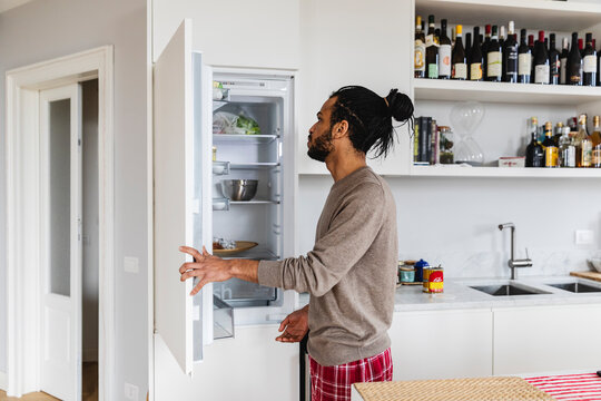 Man preparing breakfast at home 