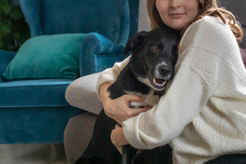 adopt a dog, close up of woman hugging a dog