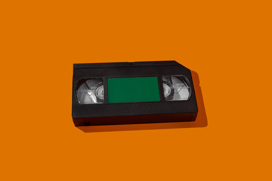 videotape on an orange background