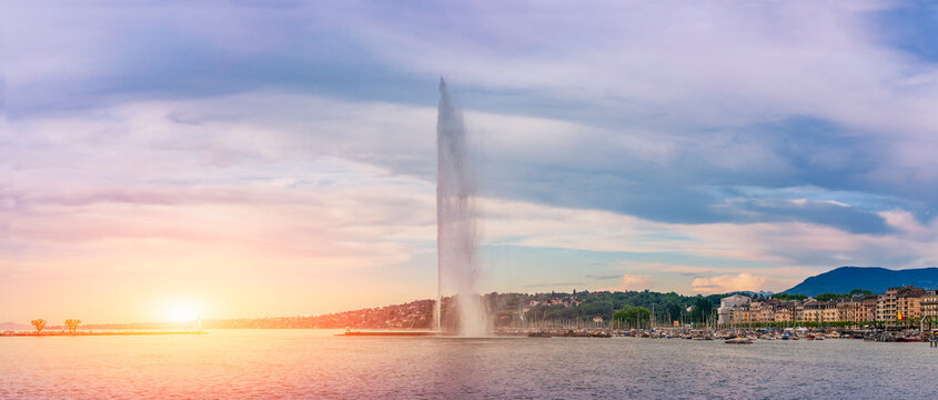 The Jet d'eau foutain, View on famous big fountain on geneva lake leman Jet d'eau at sunrise sunset, Switzerland