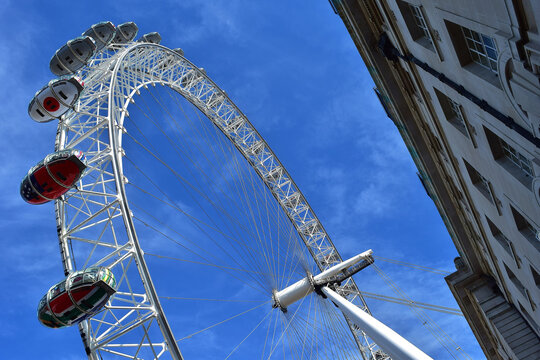 LONDON, UNITED KINGDOM - Aug 22, 2015: The London Eye ferris wheel in London, next to the river Thames, a landmark of the city of London