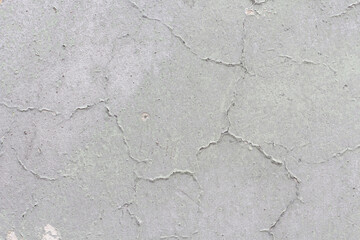 Obraz premium Close up of textured racked white old wall background. Copy space option