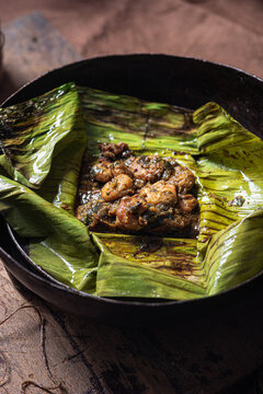 South Indian style shrimp/prawn masala cooked in a banana leaf