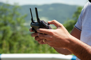 man holding drone remote control