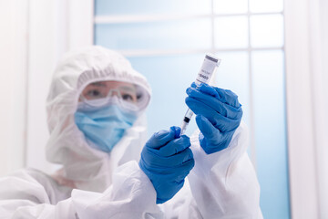 Doctor with COVID-19 vaccine