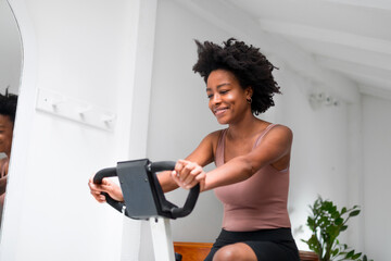 Woman Riding a Stationary Bike