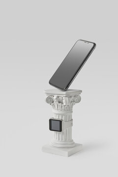 Smartwatch and smartphone on white antique column