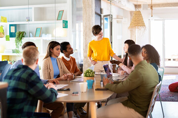 Portrait Of Coworkers Working Together In Office