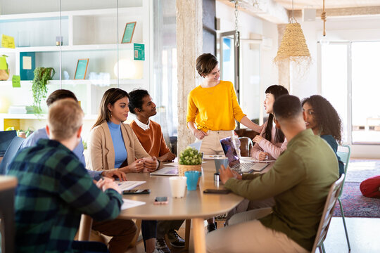 Portrait Of Coworkers Working Together In Office