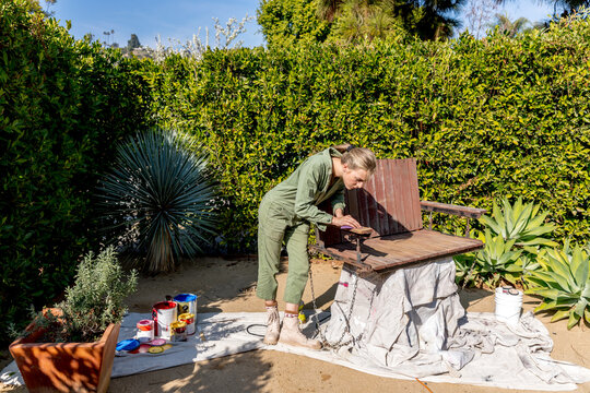 Woman Works With Furniture 
