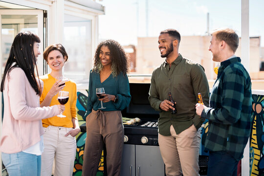 Multi-ethnic Friends Having Glass of Wine