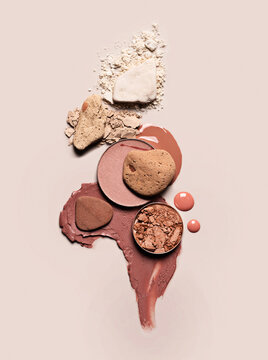 Beige and coral cosmetics flat lay