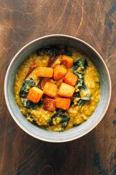 Red lentil soup with swiss chard and pumpkin