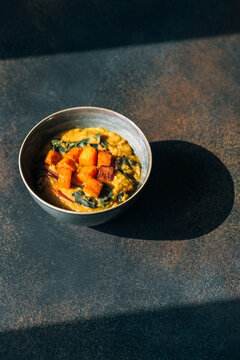 Red lentil soup with swiss chard and pumpkin