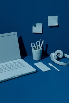 top view of a work desk in blue tones.