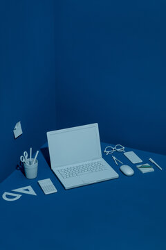 top view of a work corner in blue tones.